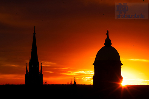 MLC 1.27.25 Sunset 03.jpg by Michael Caterina/University of Notre Dame January 27, 2025; The sun sets behind the Basilica and Dome. (Photo by Michael Caterina/University of Notre Dame)