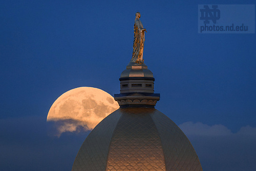 MC 10.6.25 Moonrise 03.jpg by Matt Cashore/University of Notre Dame October 6, 2025; Moonrise behind the Dome (Photo by Matt Cashore/University of Notre Dame)